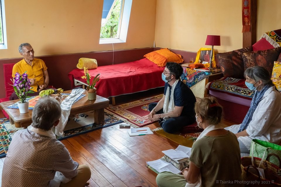 Yangsi Rinpoche sitting with students